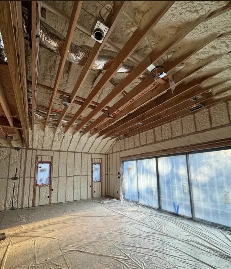 Interior walls and ceiling insulated with spray foam during new construction in Whitman